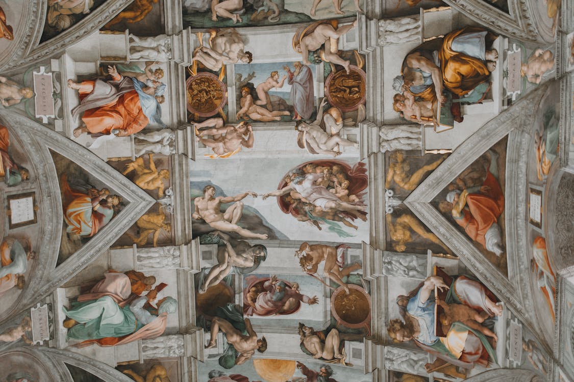 Michelangelo's Sistine Chapel ceiling fresco — the Creation of Adam and the surrounding biblical narrative painted 1508–1512